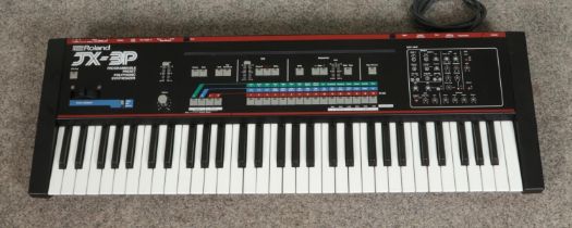 A Roland JX-3P Programmable Preset Polyphonic Synthesizer Keyboard. No plug, untested.