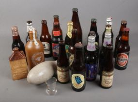 A collection of brewery and other advertising bottles including Brakspears, Silver Jubilee and royal