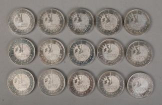 Fifteen 1999 Millennium commemorative Â£5 Coins.
