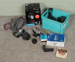 A box of assorted cameras and accessories to include Zenit-E, Praktica MTL 5B, Sennheiser