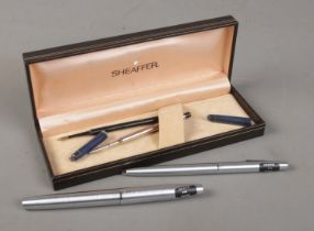 A cased Sheaffer 444 two pen set.