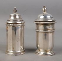 Two Birmingham silver pepper pots hallmarked for 1920 (maker unknown) and 1939 by William Neale &