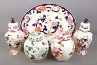 A collection of Mason's ceramics including ginger jars and platter.