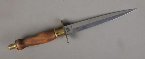 J. Nowill and Sons, Sheffield double edged commando knife featuring turned wooden handle with