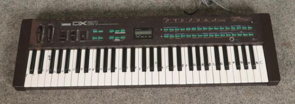 A Yamaha DX21 Digital Programmable synthesizer keyboard.