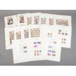 A collection of Coronation commemorative stamp sheets and first day covers to include Ascension