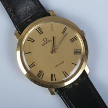 A gents gold plated Omega De Ville manual wristwatch. Not running. Doesn't wind.