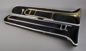 A Blessings trombone in hard carry case.