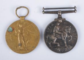 A pair of WWI medals to include Victory medal and silver British War medal. Both inscribed to