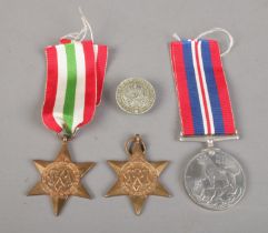 Three WWII medals, including 1939-45 medal, The Italy Star and 1939-45 Star, together with a