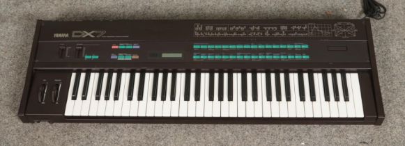 A Yamaha DX7 Digital Programmable Algorithm synthesizer keyboard. No plug, untested.