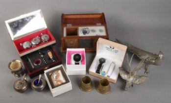 A quantity of collectables. Includes Hira radio/table lighter, white metal cock and pheasant, trench