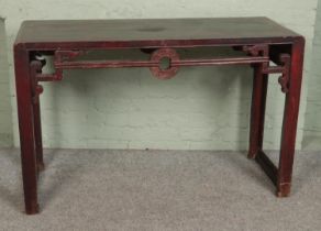 A Chinese altar side table with an open carved frieze. Hx81cm Wx128cm Dx50cm