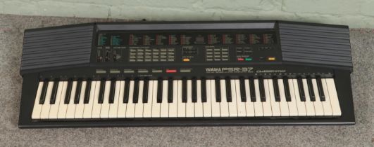 A Yamaha PSR-37 electric keyboard.