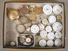 A tray of watch parts. Includes pocket and fob watch movements, ladies manual watch heads; Roamer