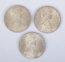 Three Maria Theresa thalers, all dated 1780. Approximately 28g each.
