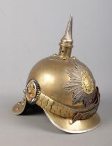 A World War One pickelhaube bearing Saxon coat of arms.