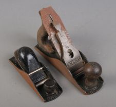 A Stanley No. 4 plane along with a Record No. 0120 example.