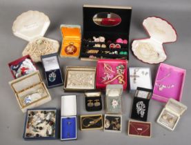 A collection of boxed costume jewellery. Includes cufflinks, earrings, pendant on chain etc.