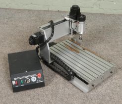 A desktop engraving machine router.