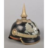 A World War One Imperial German officers pickelhaube. Bearing eagle badge with motto Mit Gott Fur