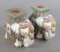 Two oriental ceramic jardiniÃ¨res/plant stands in the form of elephants. Height 26cm.