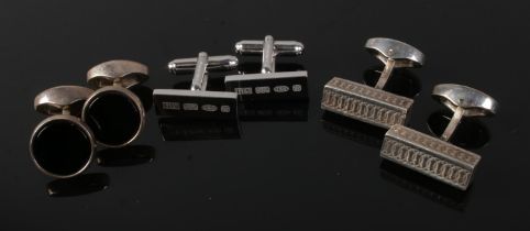 Three pairs of silver cufflinks produced by Crombie and Burberry. 50.6g