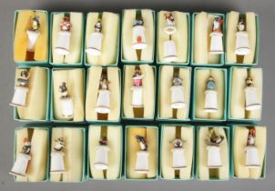 Twenty seven boxed Meet The Penguins bone china thimbles.