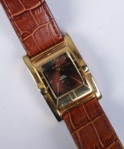 A gents gilt metal Pivot quartz wristwatch, with reversible watch head. On original strap.