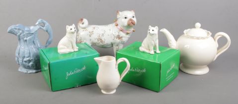 A quantity of ceramics. Includes Victorian moulded jug, Meissen style pug, two boxed John Beswick