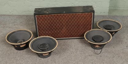 Four Goodman's Audiom 12P-D guitar amplifier speakers along with one empty Bass amplifier cab.