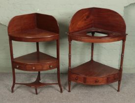 Two mahogany two tier corner wash stands both having central drawer to lower flanked by two faux