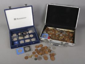 Two cases of mostly pre-decimal British coins to include good collection of commemorative crowns.