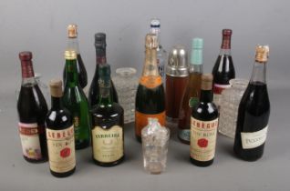 A collection of alcohol including Verve Clicquot Ponsardin, Le Begue Vin Rose, Lambrusco Emilia,