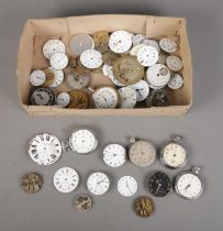 A box of assorted pocket watch spares and movements to include Ingersoll, Smiths, Weir and Sons,
