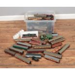 A large collection of model trains and carriages including a school class 220 SR, various