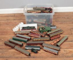 A large collection of model trains and carriages including a school class 220 SR, various