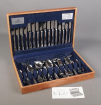 A Viners oak cased canteen of Tudor cutlery. 100 pieces.