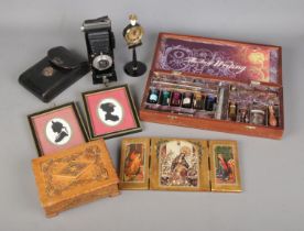 A quantity of assorted collectables to include Authentic Models The Art of Writing set, Kodak Six-20