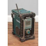 A Makita portable battery powered radio.