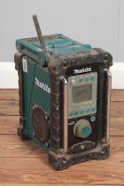 A Makita portable battery powered radio.