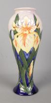 A Moorcroft pottery vase decorated in the Windrush design. Date cypher for 2001. Height 28cm.