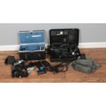 A collection of assorted cameras and accessories to include Panasonic MC30, Yashica ElectroAX,