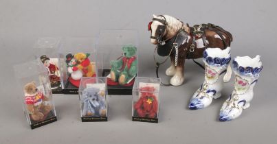 A collection of World of Miniature Bears Small Bears for Big World displays along with ceramic draft