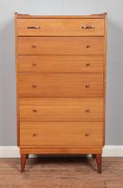 A vintage teak Austinsuite tallboy chest of six drawers. Height: 115cm, Width: 64cm, Depth: 40cm.