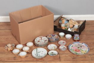 Two boxes of oriental ceramics to include tea wares, plates, etc.