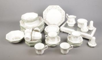 A collection of Johnson Bros Eternal Beau ceramics to include milk jug, cups, salt and pepper