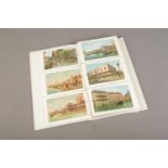 An album of postcards including city scape scenes of Venice/Venezia, coastal scenes, English