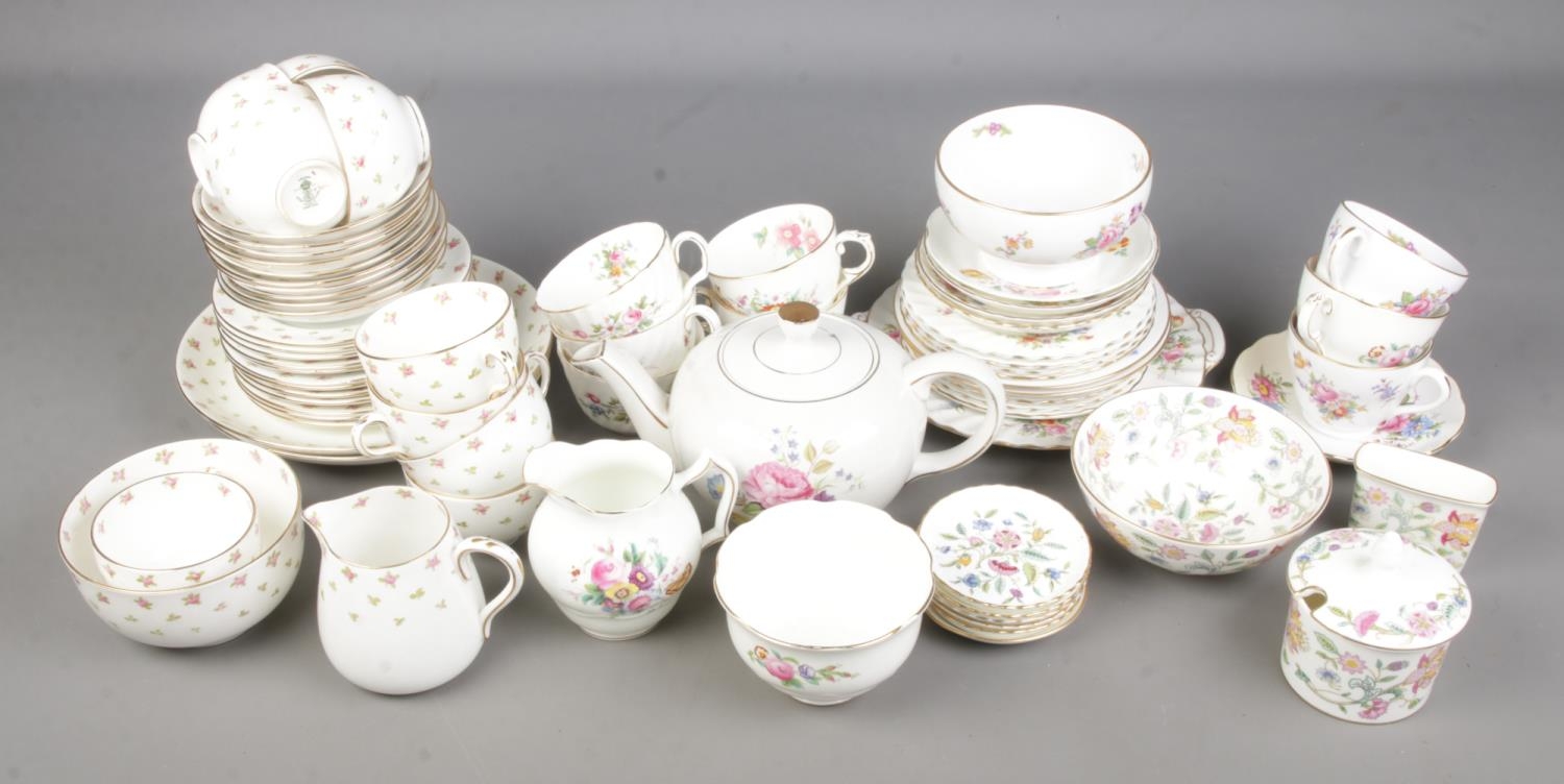 A small quantity of Minton Haddon Hall gold edge dinnerwares including jam pot with lid, coasters,