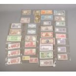 A good collection of international bank notes to include Bank of England, Israel, India, Pakistan,